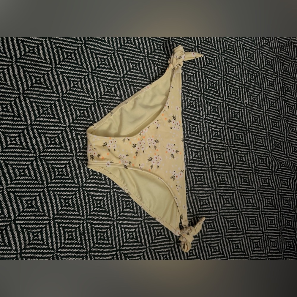 Pastel yellow floral swimsuit bottoms